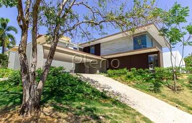 Imagem: A casa em condomínio possui 4 Dormitórios, 5 Banheiros, 3