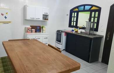 Imagem 6: Casa na praia de Indaiá, Bertioga, SP, possui 120m2 e fica a 750m da...