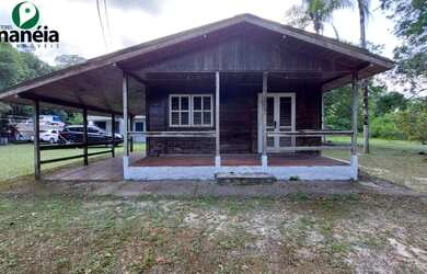Imagem: A casa possui 3 Dormitórios, 1 Banheiro, 1 Vaga na garagem