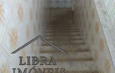 Imagem: A casa possui 3 Dormitórios, 1 Banheiro, 1 Vaga na garagem