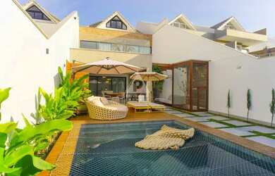 Imagem: A casa em condomínio possui 5 Dormitórios, 5 Banheiros, 3