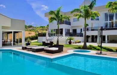 Imagem: A casa em condomínio possui 5 Dormitórios, 5 Banheiros, 5