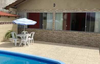 Imagem: A casa possui 3 Dormitórios e 3 Vagas na garagem e está localizado