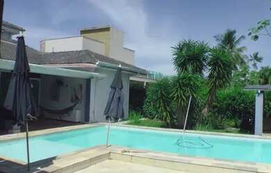 Imagem: A casa em condomínio possui 4 Dormitórios, 5 Banheiros, 4