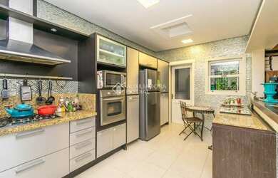 Imagem 2: Sobrado de nível com pier ao Guaiba