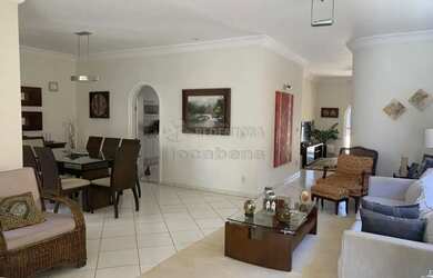 Imagem: A casa possui 3 Dormitórios, 4 Banheiros, 4 Vagas na garagem