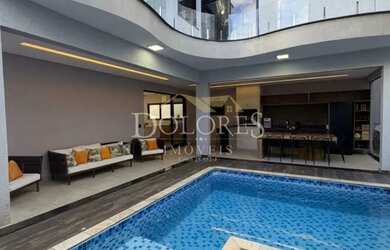 Imagem: A casa em condomínio possui 4 Dormitórios, 5 Banheiros, 5