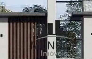 Imagem: A casa possui 3 Dormitórios, 3 Banheiros, 2 Vagas na garagem