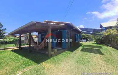 Imagem: A casa possui 5 Dormitórios, 3 Banheiros, 5 Vagas na garagem