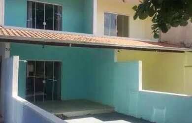 Imagem: A casa possui 2 Dormitórios, 1 Banheiro, 2 Vagas na garagem