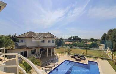 Imagem: A casa em condomínio à venda possui 5 Dormitórios, 5 Banheiros