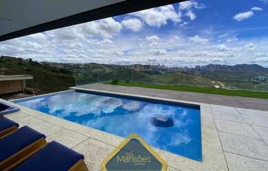 Imagem: A casa em condomínio possui 4 Dormitórios, 5 Banheiros, 5