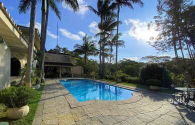 Imagem: A casa em condomínio possui 5 Dormitórios, 5 Banheiros, 5