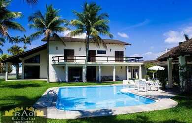 Imagem: A casa possui 5 Dormitórios, 2 Banheiros, 5 Vagas na garagem