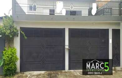 Imagem: A casa possui 2 Dormitórios, 3 Banheiros, 4 Vagas na garagem