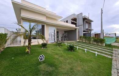 Imagem: A casa em condomínio possui 3 Dormitórios, 4 Banheiros, 2