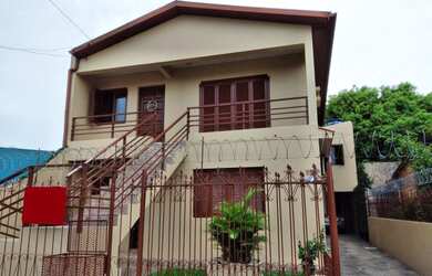 Imagem: A casa possui 5 Dormitórios, 5 Banheiros, 2 Vagas na garagem