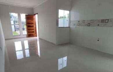 Imagem: A casa possui 2 Dormitórios, 1 Banheiro, 2 Vagas na garagem