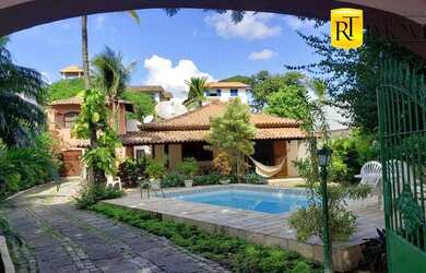 Imagem: A casa possui 4 Dormitórios, 3 Banheiros, 595m² de Área e