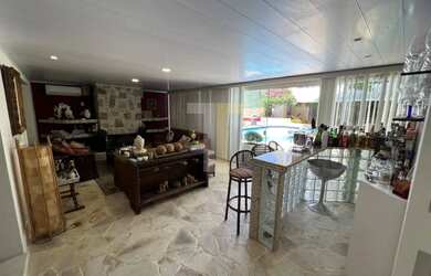 Imagem 8: CASA MARAMAR RECREIO. Piscina, Churrasqueira, Área de serviçoeLareira