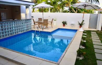 Imagem: A casa em condomínio à venda possui 4 Dormitórios, 5 Banheiros