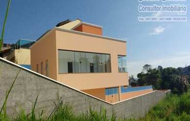 Imagem: A casa possui 3 Dormitórios, 4 Banheiros, 4 Vagas na garagem