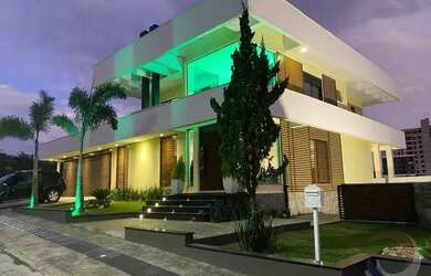 Imagem: A casa e possui 3 Dormitórios, Suítes, 4 Banheiros, 3 Vagas