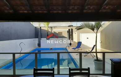 Imagem: A casa possui 5 Dormitórios, 3 Banheiros, 5 Vagas na garagem