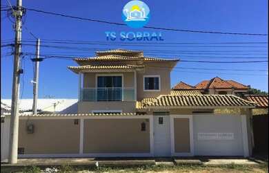 Imagem: A casa possui 3 Dormitórios, 3 Banheiros, 3 Vagas na garagem