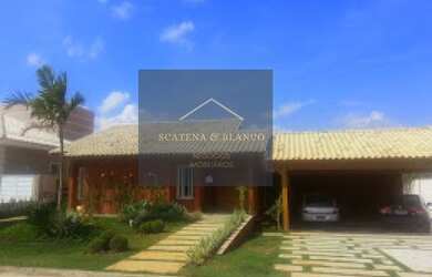 Imagem: A casa em condomínio possui 4 Dormitórios, 5 Banheiros, 2