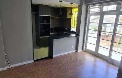 Imagem: O apartamento possui 1 Dormitório, 1 Banheiro, 1 Vaga na garagem