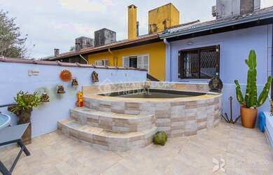 Imagem: A casa em condomínio possui 3 Dormitórios, 3 Banheiros, 2