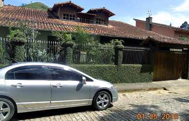 Imagem: A casa em condomínio possui 5 Dormitórios, 5 Banheiros, 3