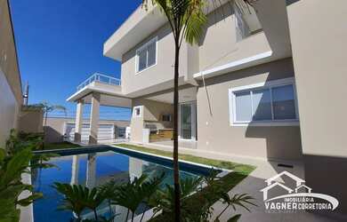 Imagem: A casa possui 3 Dormitórios, 5 Banheiros, 5 Vagas na garagem