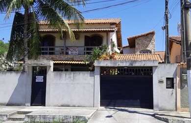 Imagem: A casa possui 5 Dormitórios, 5 Banheiros, 2 Vagas na garagem