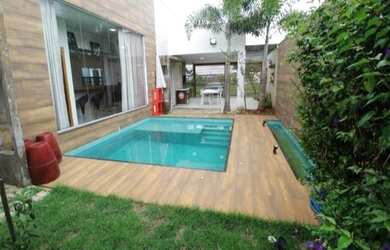 Imagem: A casa em condomínio possui 4 Dormitórios, 4 Banheiros, 2