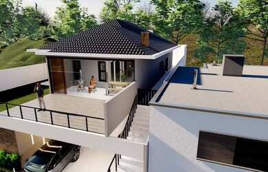 Imagem: A casa possui 3 Dormitórios, 4 Banheiros, 4 Vagas na garagem