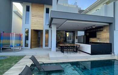 Imagem: A casa em condomínio possui 5 Dormitórios, 5 Banheiros, 3