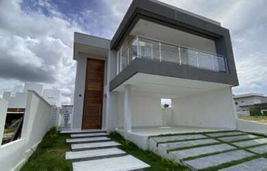 Imagem: A casa possui 4 Dormitórios, 4 Banheiros, 2 Vagas na garagem