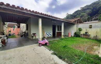 Imagem: A casa possui 2 Dormitórios, 1 Banheiro, 4 Vagas na garagem