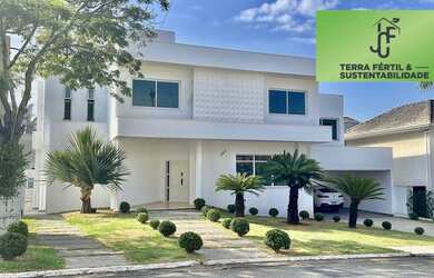 Imagem: A casa em condomínio possui 4 Dormitórios, 5 Banheiros, 5