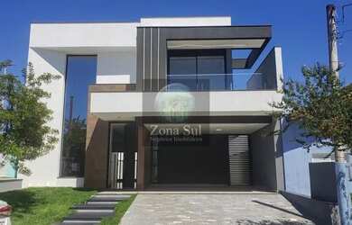 Imagem: A casa em condomínio possui 3 Dormitórios, 4 Banheiros, 4