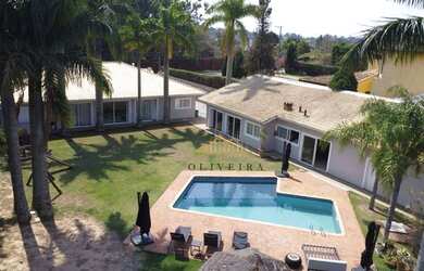 Imagem: A casa em condomínio possui 5 Dormitórios, 5 Banheiros, 5