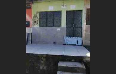 Imagem: A casa possui 2 Dormitórios e 1 Banheiro e está localizado