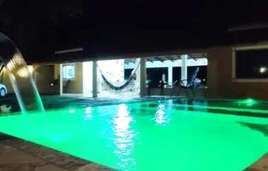 Imagem: A pousada chalé possui 4 Dormitórios, 4 Vagas na garagem e