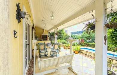 Imagem: A casa em condomínio possui 5 Dormitórios, 5 Banheiros, 4