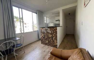 Imagem: O apartamento possui 1 Dormitório, 1 Banheiro, 1 Vaga na garagem