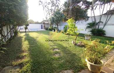 Imagem: A casa possui 3 Dormitórios, 3 Banheiros, 5 Vagas na garagem