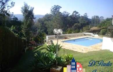 Imagem: A casa em condomínio possui 5 Dormitórios, 4 Banheiros, 4