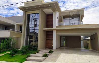 Imagem: A casa em condomínio possui 4 Dormitórios, 5 Banheiros, 4